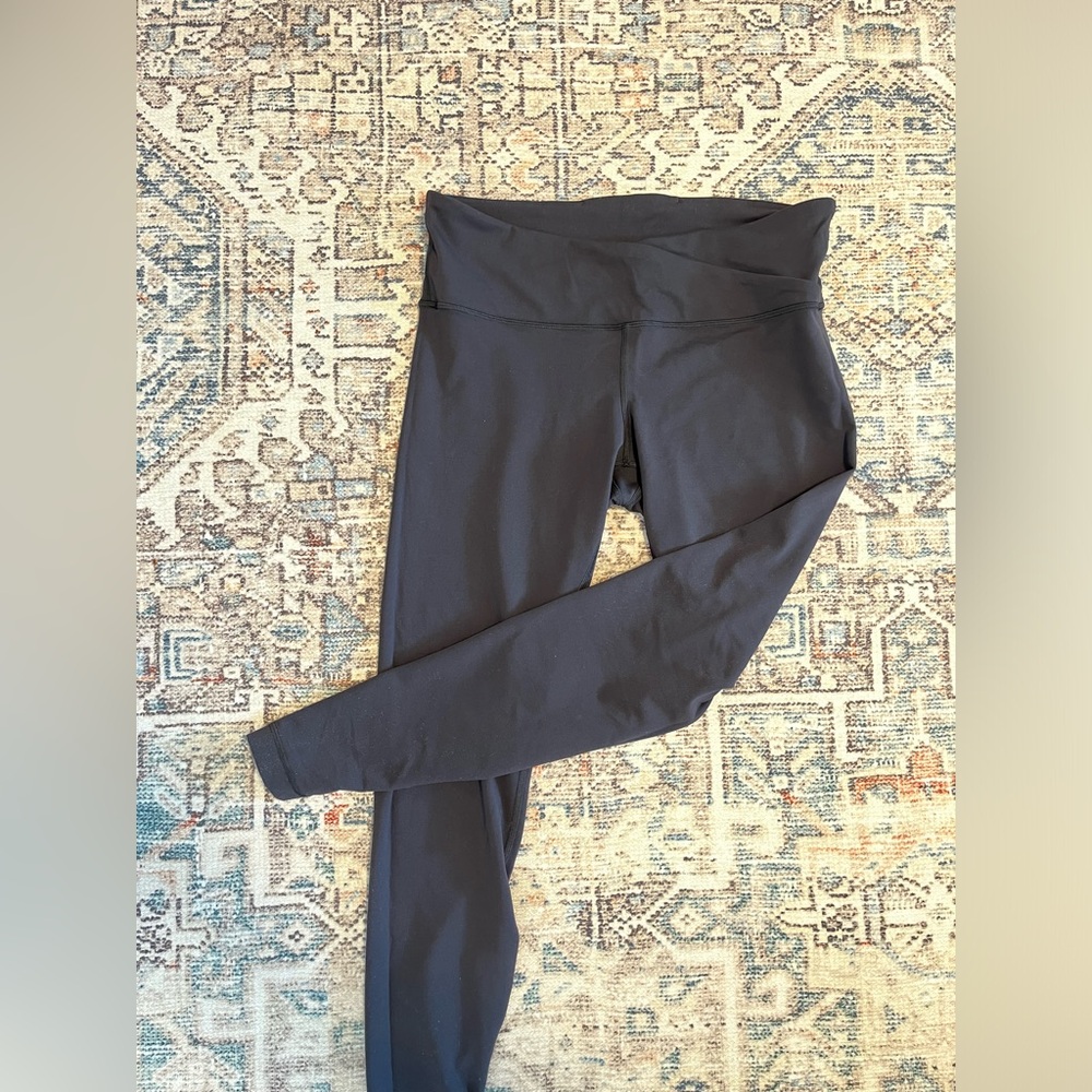 Lululemon full length leggings with cross front. Size 12. Black